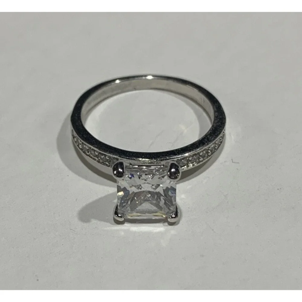 JewelScent Solitaire CZ Ring Size 7 Rhodium Plated Brass Princess Cut Accents